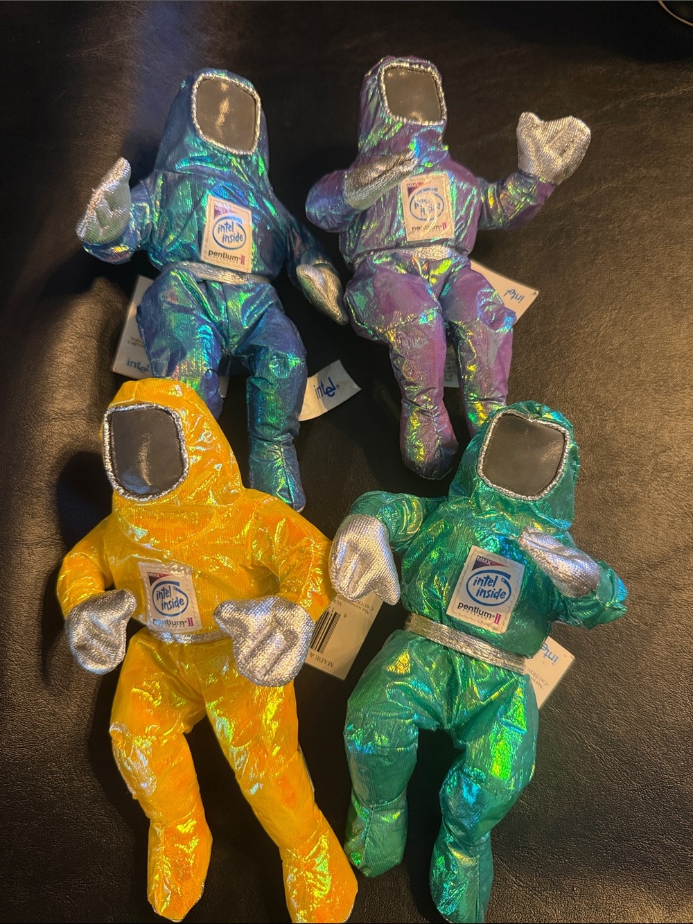 Intel Iridescent Plush Astronauts in Yellow, Teal, Purple and Blue